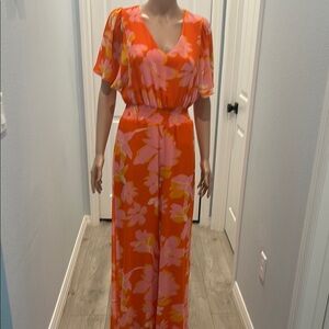 Floral Orange Jumpsuit/Zipper in the back, fully lined.